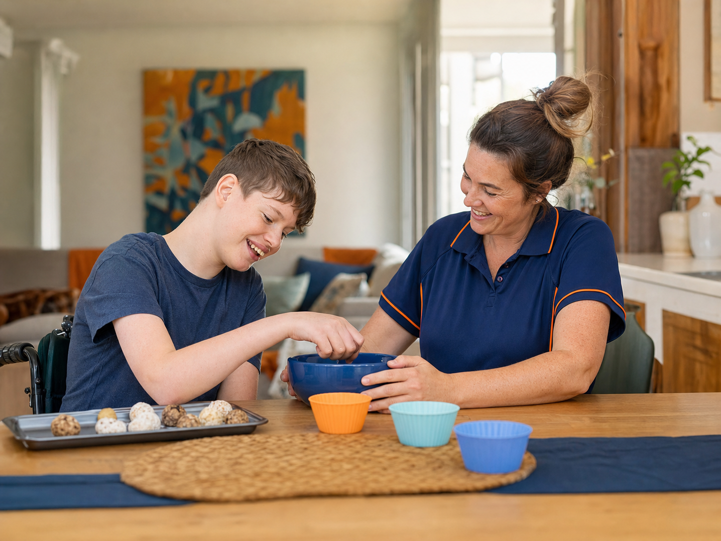 A child with disability and a support worker preparing food at home